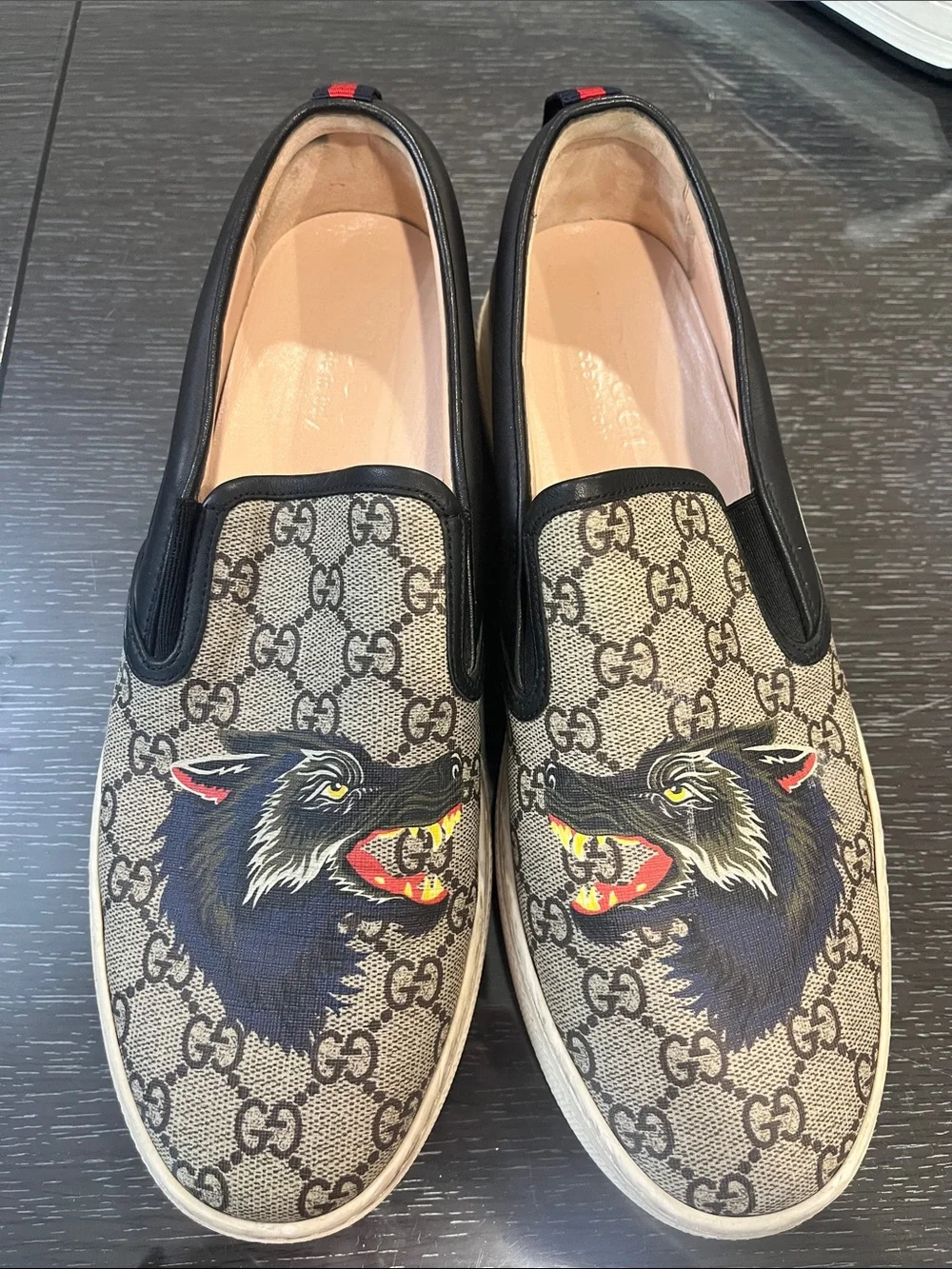Gucci Beige GG Supreme Canvas Slip-On Sneakers with Black Wolf Graphic